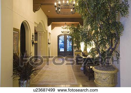Chandelier in Palm Springs entrance hallway View Large Photo Image Stock Photo - Chandelier in Palm Springs entrance hallway. Fotosearch
