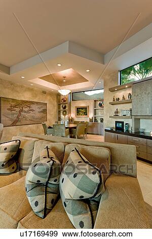 Stock Photo - Contemporary living room dining room in the background. Fotosearch