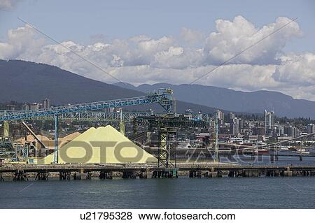 Stock Photo - Crane and materials for transportation in Vancouver Harbour British Columbia. Fotosearch