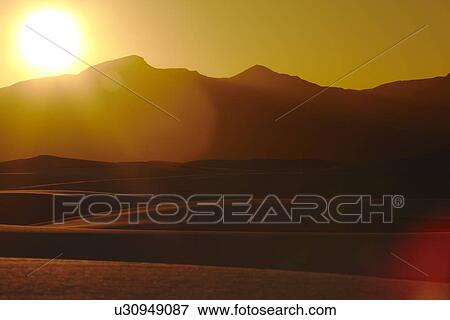 Stock Photo - Desert at sunset USA. Fotosearch