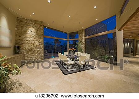 Dining room table set on rug in spacious Palm Springs home View Large Photo Image Stock Image - Dining room table set on rug in spacious Palm Springs home. Fotosearch