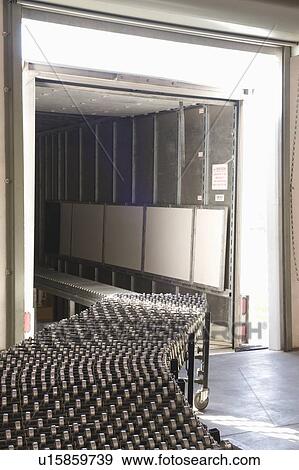 Stock Photo - Empty conveyor belt in distribution warehouse. Fotosearch