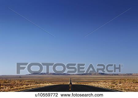 Empty road in desert USA View Large Photo Image Stock Image - Empty road in desert USA. Fotosearch