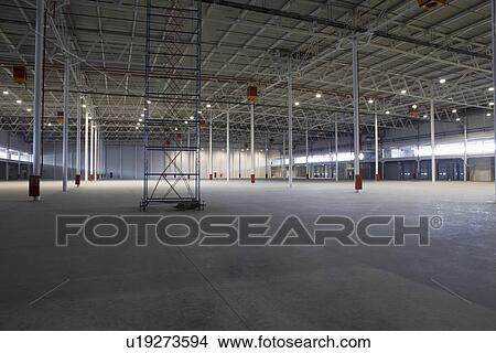 Empty warehouse with scaffold View Large Photo Image Picture - Empty warehouse with scaffold. Fotosearch