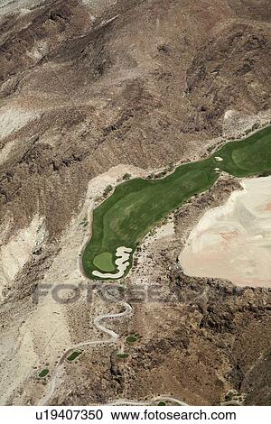 Stock Image - Fairway of a golf course in Nevada. Fotosearch