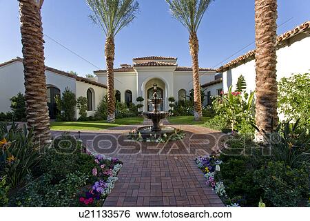 Stock Photograph - Front yard of house in colonial style. Fotosearch