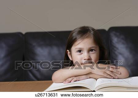 Stock Image - Girl with book. Fotosearch