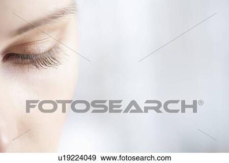 Gold eye shadow on caucasian woman View Large Photo Image Stock Photo - Gold eye shadow on caucasian woman. Fotosearch