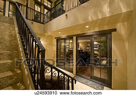 Hallway with staircase in modern home View Large Photo Image Stock Image - Hallway with staircase in modern home. Fotosearch