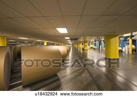 Huge rolls of paper in newspaper factory View Large Photo Image Picture - Huge rolls of paper in newspaper factory. Fotosearch