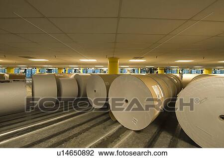 Huge rolls of paper in newspaper factory View Large Photo Image Stock Image - Huge rolls of paper in newspaper factory. Fotosearch