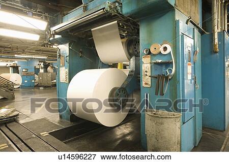 Stock Photo - Huge rolls of paper in newspaper factory. Fotosearch