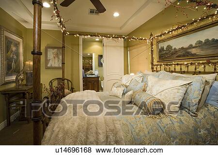 Stock Photo - Illuminated residence bedroom. Fotosearch