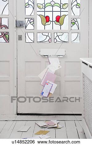 Letters posted through stained glass front door View Large Photo Image Stock Photograph - Letters posted through stained glass front door. Fotosearch