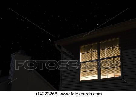 Lit window of building exterior View Large Photo Image Stock Photo - Lit window of building exterior. Fotosearch