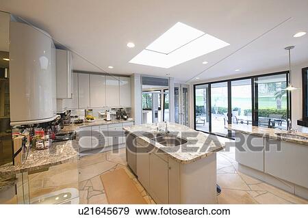 Marble topped worktop units in Palm Springs kitchen View Large Photo Image Stock Photo - Marble topped worktop units in Palm Springs kitchen. Fotosearch