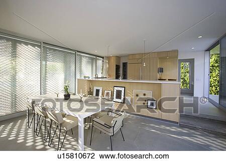 Stock Image - Modern dining area home interior. Fotosearch