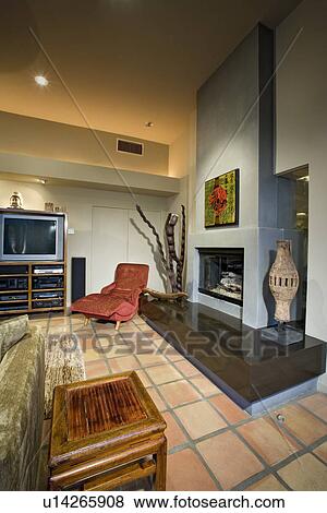 Stock Photo - Modern living room with fireplace. Fotosearch