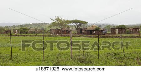 Mut huts in village Africa View Large Photo Image Stock Photograph - Mut huts in village Africa. Fotosearch