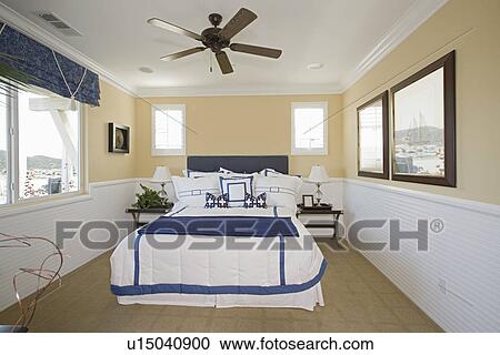 Stock Image - Nautical themed bedroom of Palm Springs home. Fotosearch
