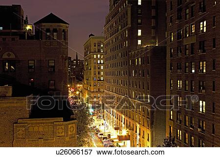 New York City street and housing elevated view at night View Large Photo Image Stock Photo - New York City street and housing elevated view at night. Fotosearch