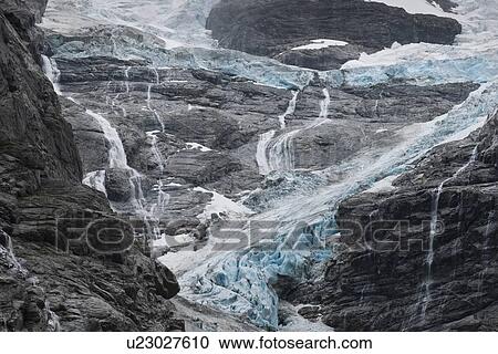 Norwegian rock face and waterfall View Large Photo Image Stock Image - Norwegian rock face and waterfall. Fotosearch