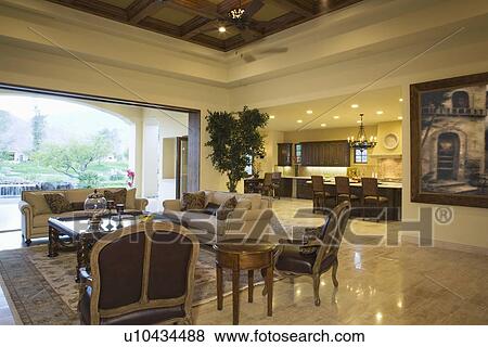 Stock Photo - Open plan seating area of Palm Springs home. Fotosearch