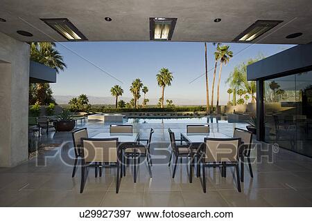 Outdoor tables on patio View Large Photo Image Stock Photo - Outdoor tables on patio. Fotosearch