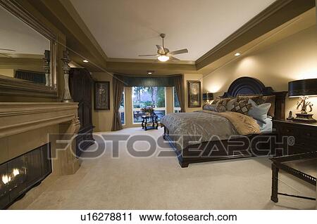Palm Springs bedroom with dark wood furniture View Large Photo Image Stock Image - Palm Springs bedroom with dark wood furniture. Fotosearch