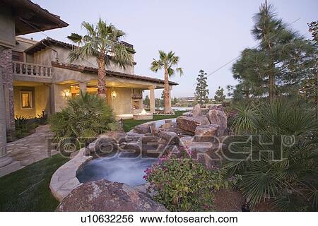 Palm Springs outdoor jacuzzi and house exterior View Large Photo Image Stock Photograph - Palm Springs outdoor jacuzzi and house exterior. Fotosearch