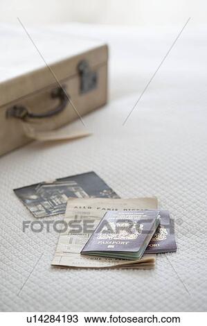 Passport and tickets with suitcase View Large Photo Image Stock Image - Passport and tickets with suitcase. Fotosearch