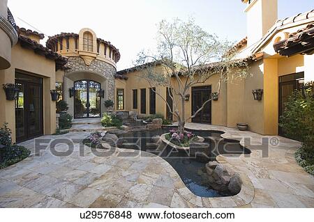 Paved courtyard garden with pool Palm Springs View Large Photo Image Stock Photo - Paved courtyard garden with pool Palm Springs. Fotosearch