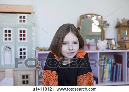 Portrait of girl sitting in bedroom View Large Photo Image Stock Image - Portrait of girl sitting in bedroom. Fotosearch