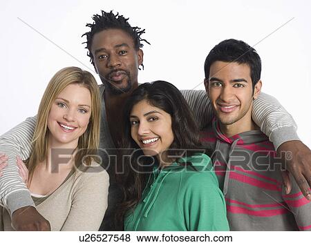 Portrait of young people embracing studio shot View Large Photo Image Stock Photo - Portrait of young people embracing studio shot. Fotosearch