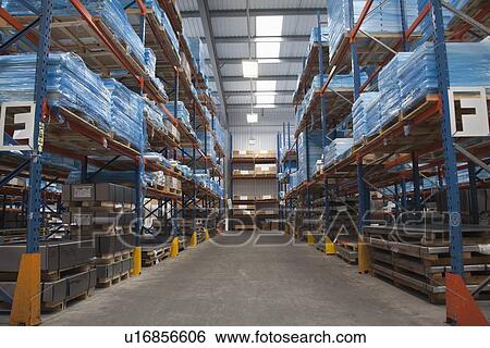 Stock Photograph - Racking ailse in commercial lighting factory. Fotosearch