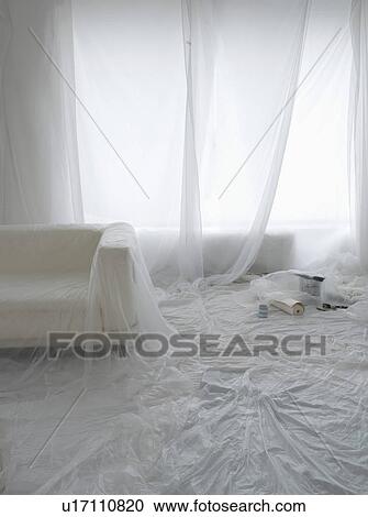 Room covered in transparent dust sheets in preparation for decorating View Large Photo Image Stock Image - Room covered in transparent dust sheets in preparation for decorating. Fotosearch