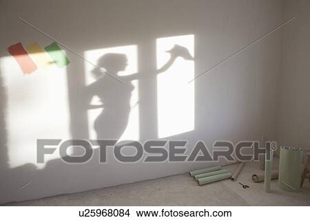 Shadow of woman cleaning windows in new apartment View Large Photo Image Picture - Shadow of woman cleaning windows in new apartment. Fotosearch