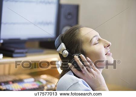 Sound engineer enjoying music View Large Photo Image Stock Image - Sound engineer enjoying music. Fotosearch