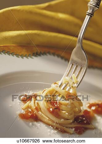 Stock Photograph - Spagheti Bolognese and fork. Fotosearch