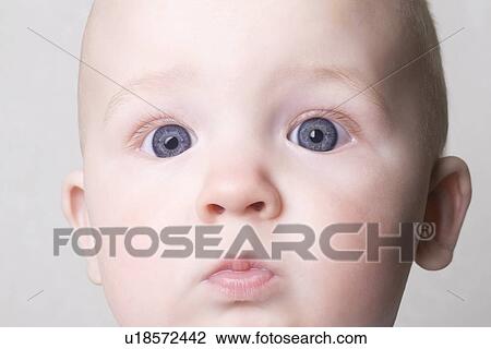 Staring 18 month old with blue eyes View Large Photo Image Stock Image - Staring 18 month old with blue eyes. Fotosearch