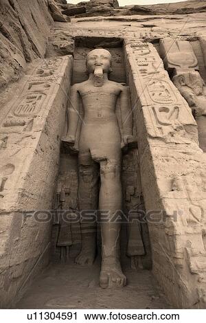 Statue of Rameses II outside the Hathor Temple of Queen Nefertari. UNESCO World Heritage Site known as the Nubian Monuments. Abu Simbel West Bank of Lake Nasser southern Egypt. Africa View Large Photo Image Stock Image - Statue of Rameses II outside the Hathor Temple of Queen Nefertari. UNESCO World Heritage Site known as the Nubian Monuments. Abu Simbel West Bank of Lake Nasser southern Egypt. Africa. Fotosearch