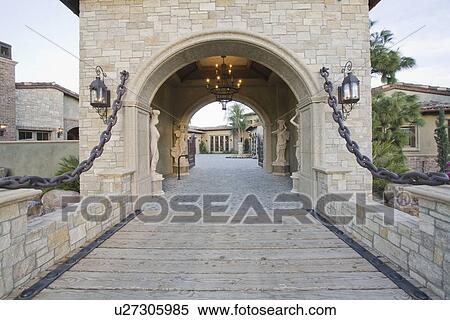 Stock Photography - Stone gateway to Palm Springs home. Fotosearch