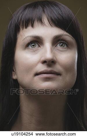 Picture - Studio portrait of womans head. Fotosearch