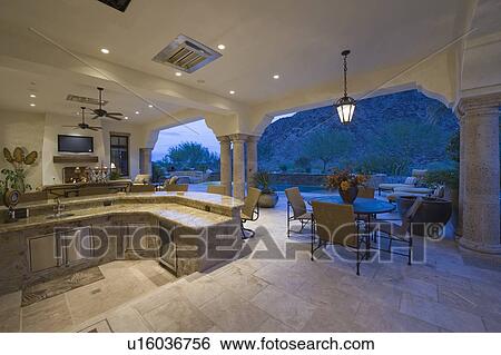 Sunken kitchen area of split level kitchen in Palm Springs home View Large Photo Image Stock Photograph - Sunken kitchen area of split level kitchen in Palm Springs home. Fotosearch