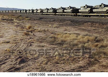Stock Photograph - Tanks on freight train USA. Fotosearch