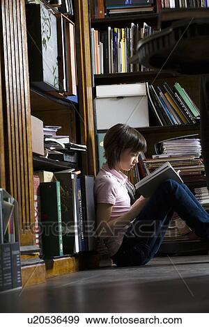 Teenage girl at library View Large Photo Image Stock Photo - Teenage girl at library. Fotosearch