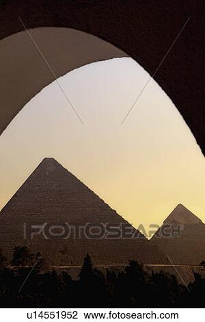 Stock Image - The Great Pyramids at sunset. Fotosearch