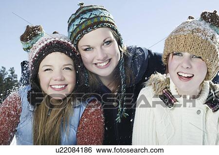 Three girls in winter clothing View Large Photo Image Stock Photograph - Three girls in winter clothing. Fotosearch