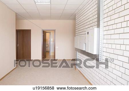 Tiled wall with fusebox in wide hallway View Large Photo Image Stock Photo - Tiled wall with fusebox in wide hallway. Fotosearch