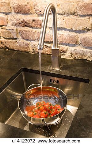 Tomatoes in colander in sink View Large Photo Image Stock Image - Tomatoes in colander in sink. Fotosearch